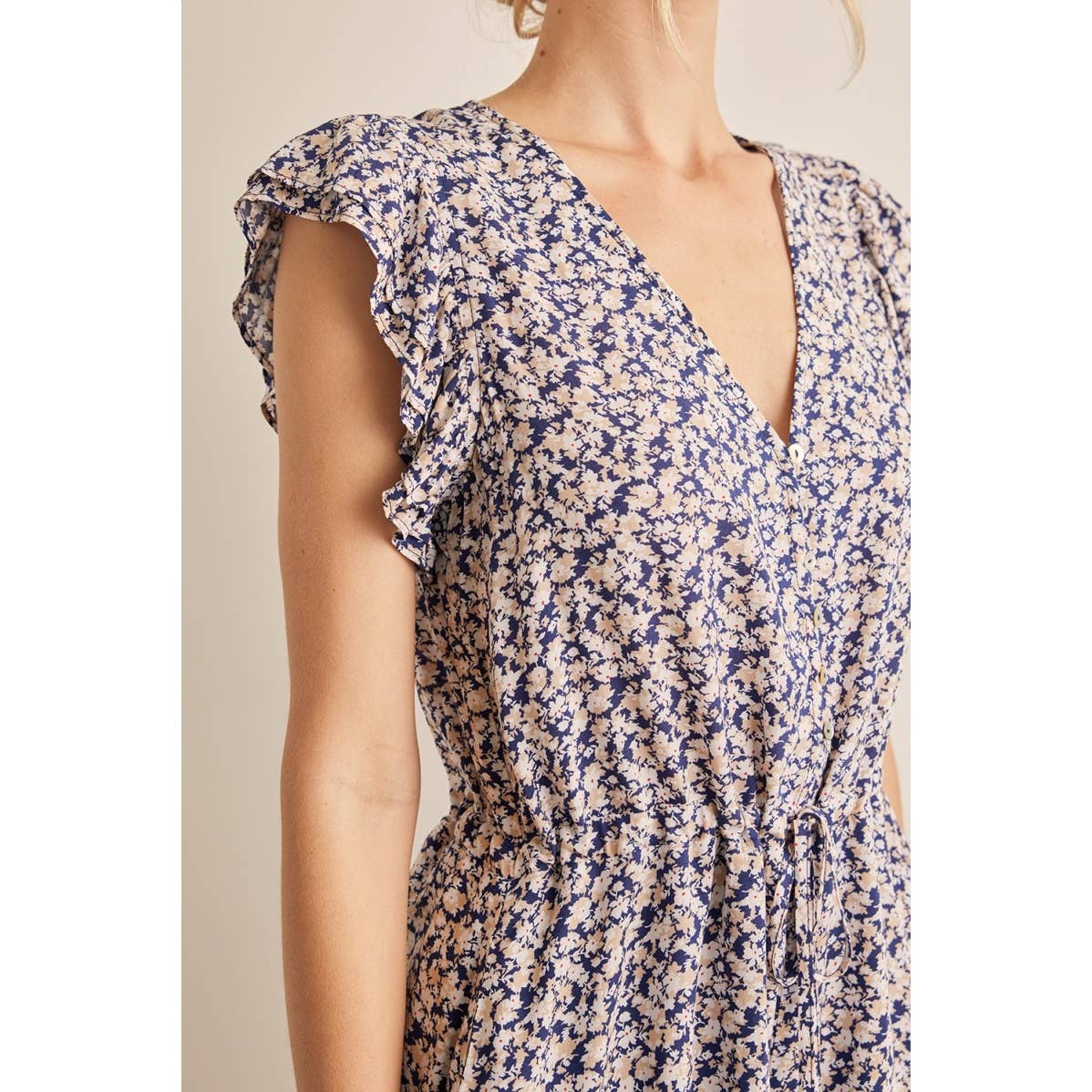 FLORAL RUFFLE SLEEVE BUTTON UP DRAWSTRING ROMPER