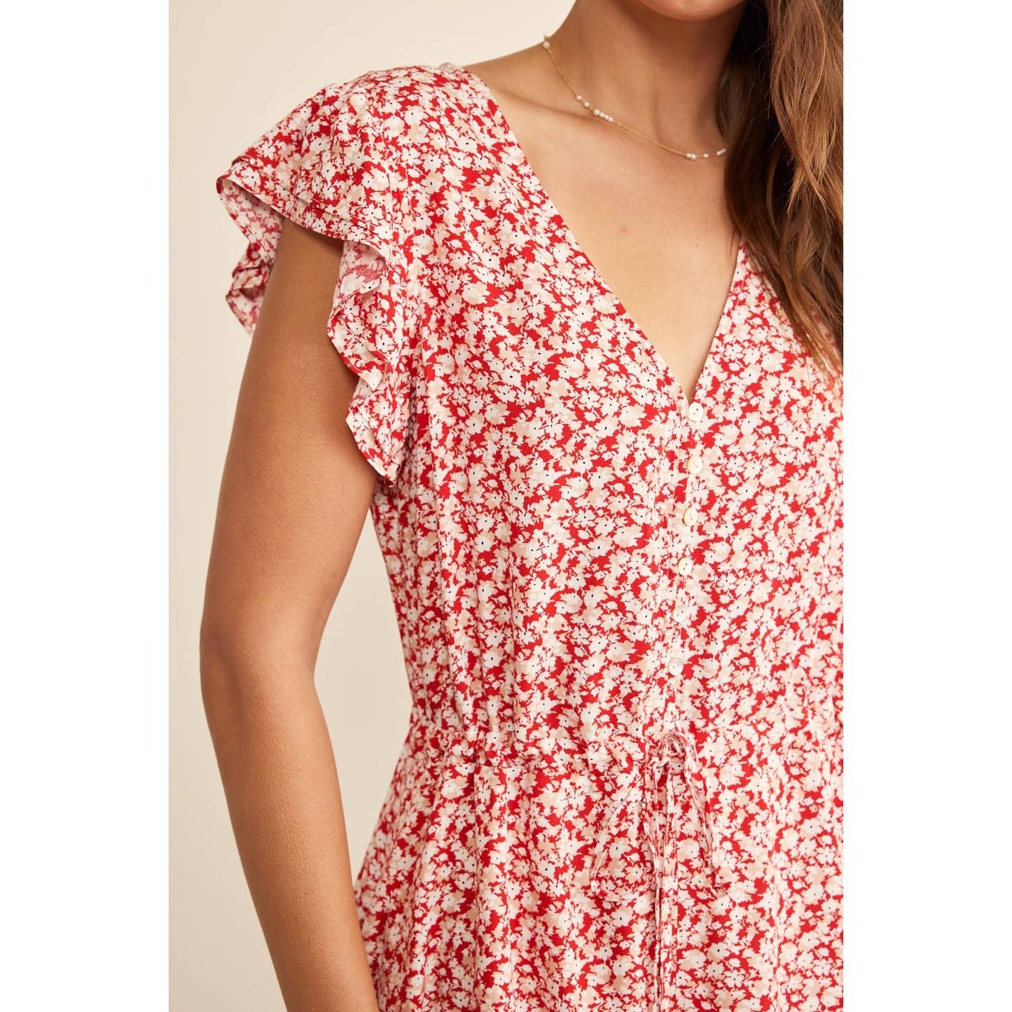 FLORAL RUFFLE SLEEVE BUTTON UP DRAWSTRING ROMPER